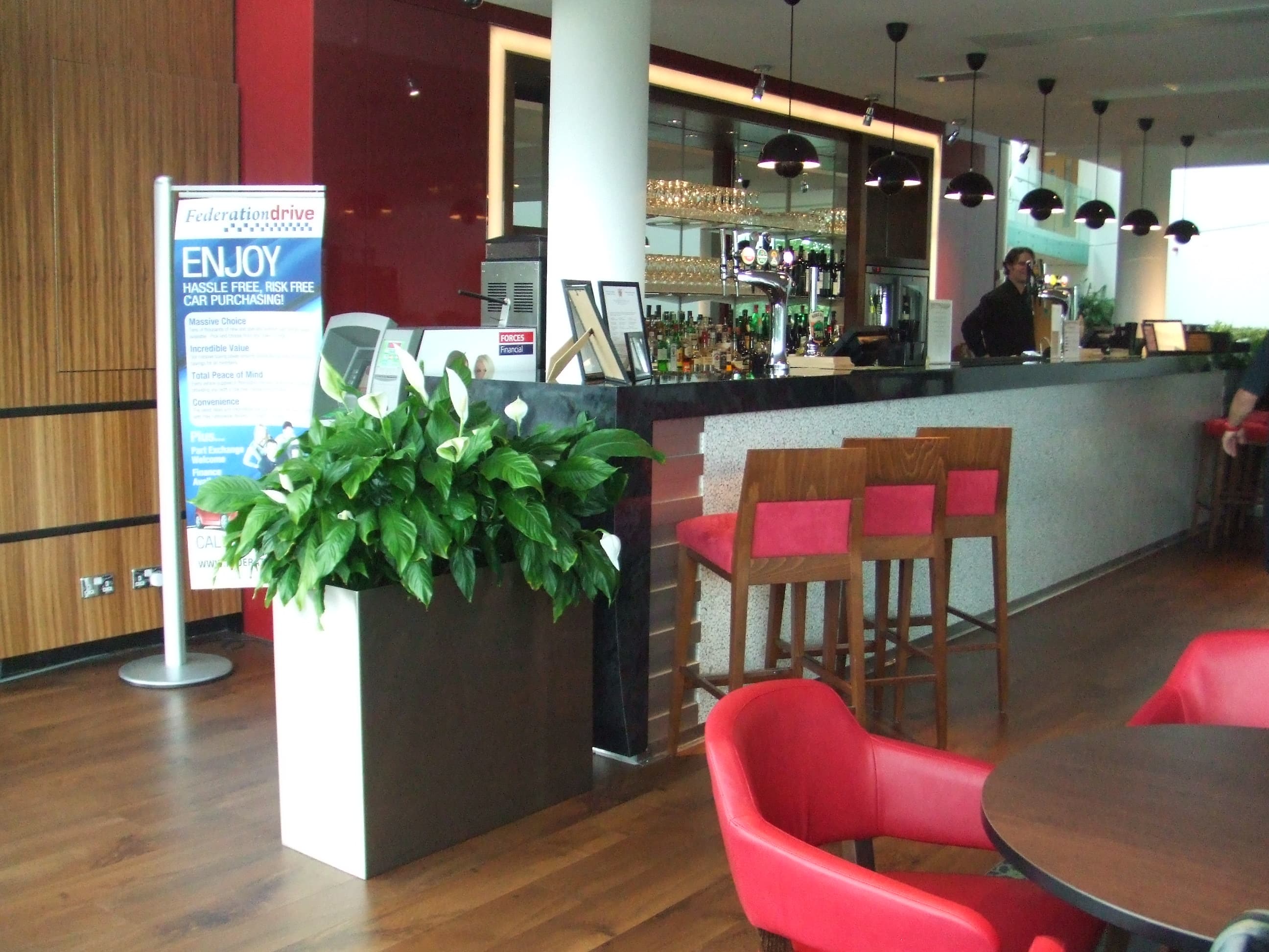 Bar and seating area — wide view